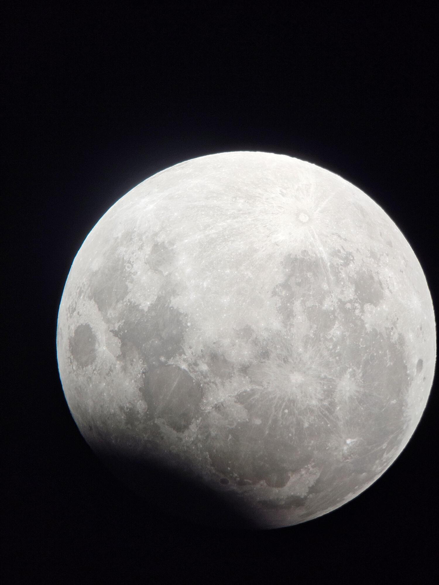 Harvest Supermoon covered by the Earth's shadow: a unique eclipse captured on camera. Photo