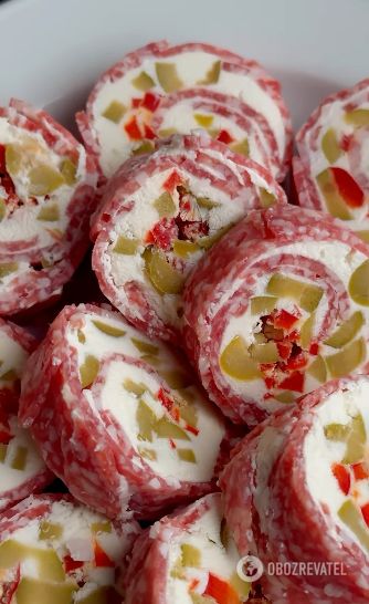 Salami roll: a quick and delicious appetizer for a festive table