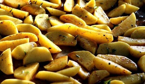 Preparing potatoes for baking