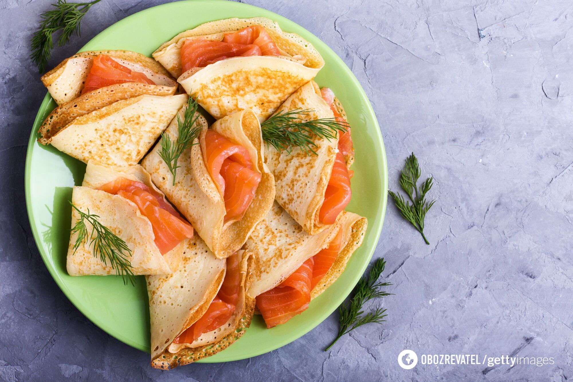 Delicious pancakes with salmon.