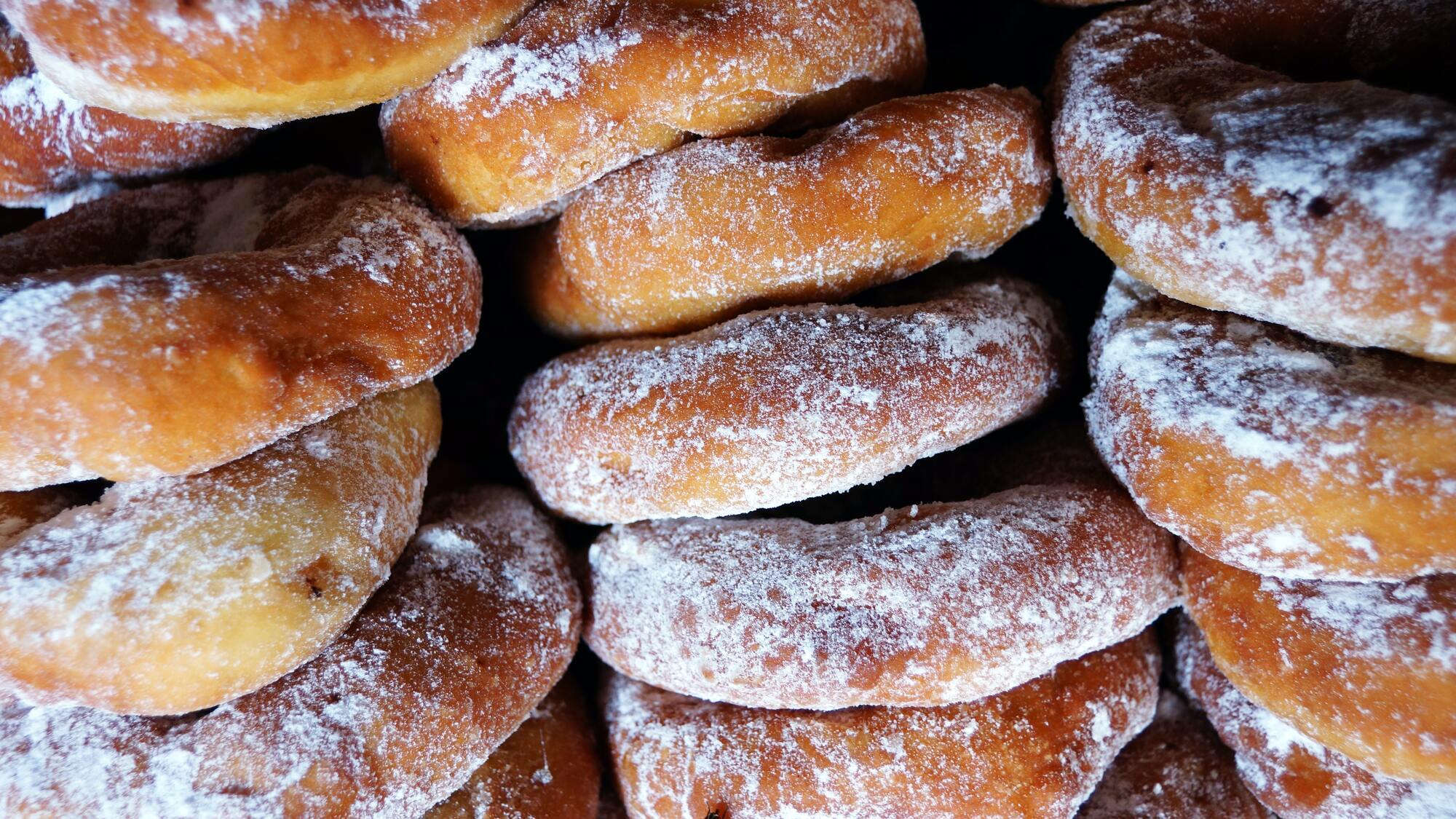 Donuts with powdered sugar.