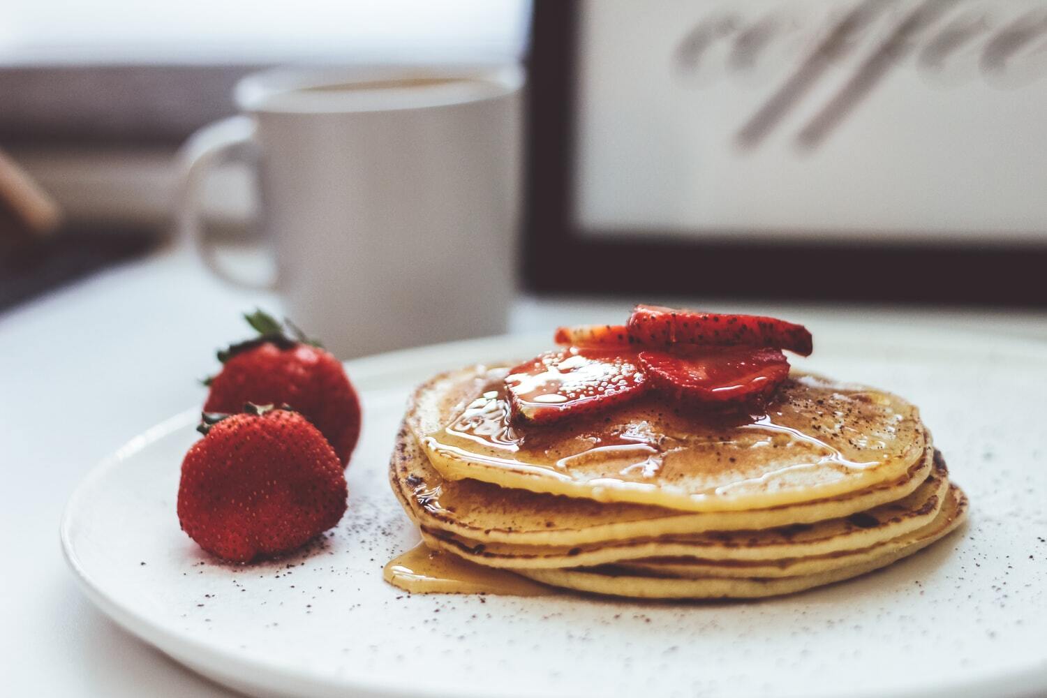 Pancakes with fruit for breakfast.