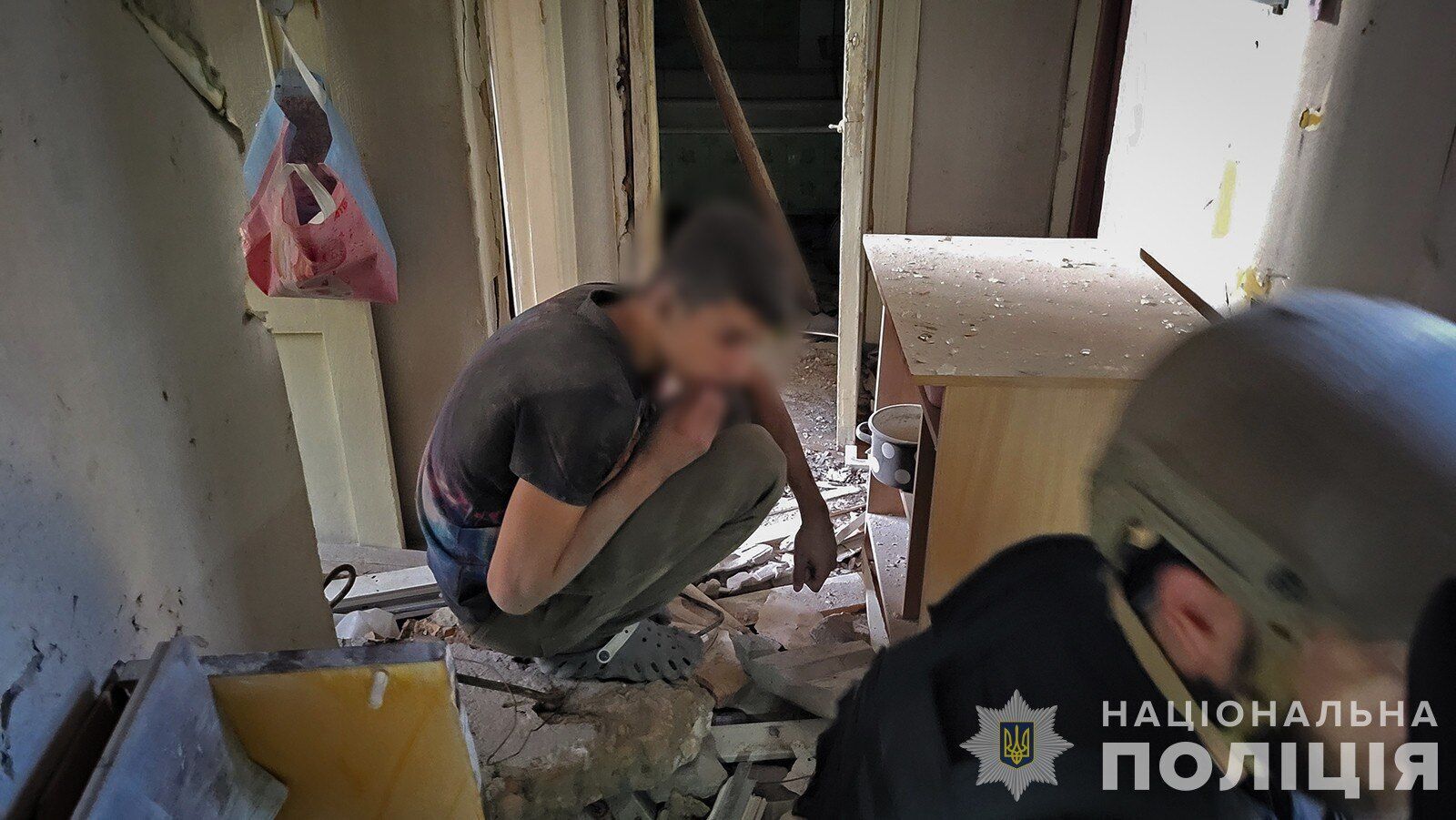 Zaporizhzhia police show photos from inside the apartment building destroyed by the occupiers