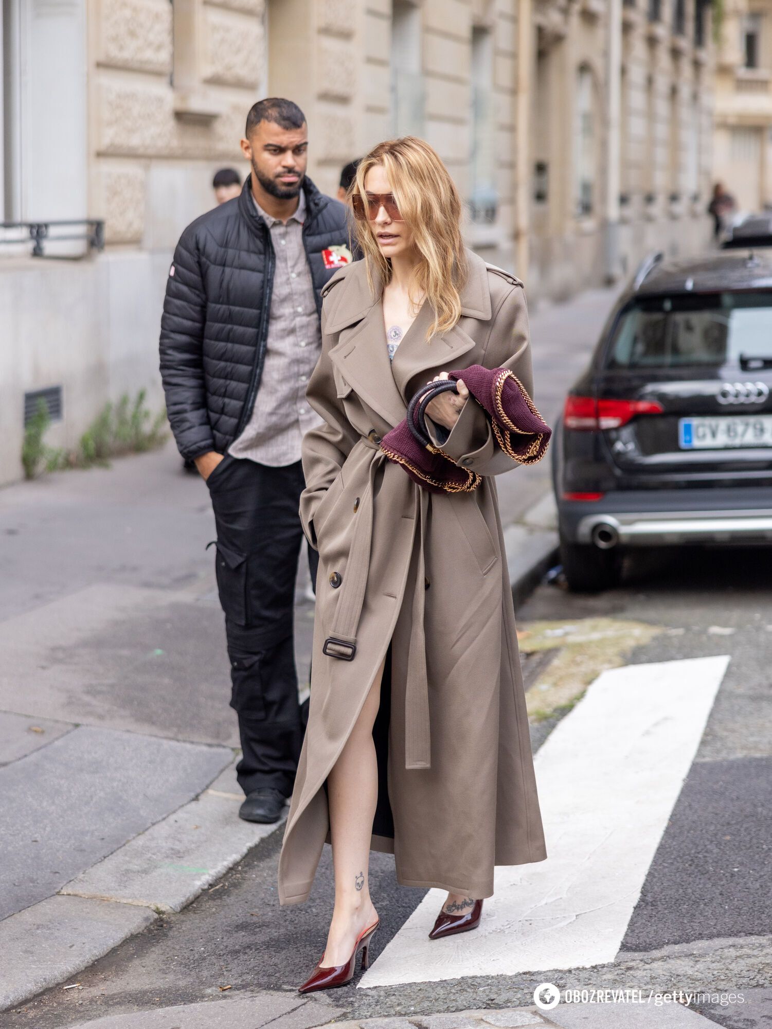 In a nude trench coat: Michael Jackson's daughter showed a bold look in Paris. Photo