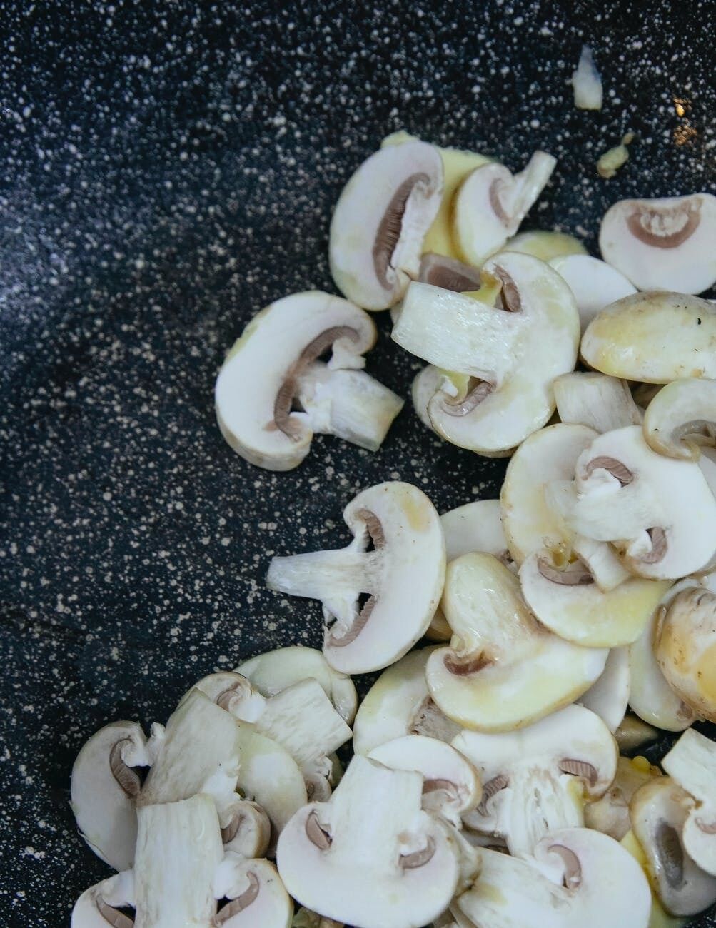 Frying mushrooms.