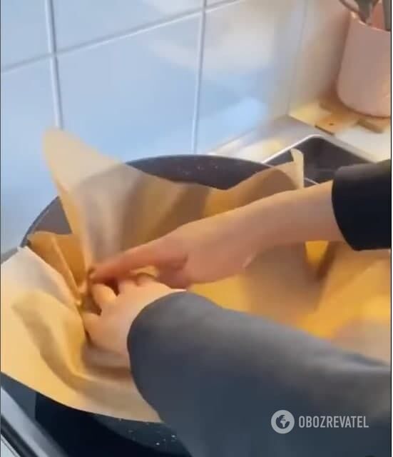 Cover the pan with parchment