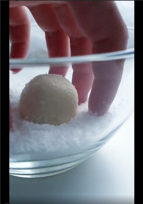 Rolling balls in coconut flakes