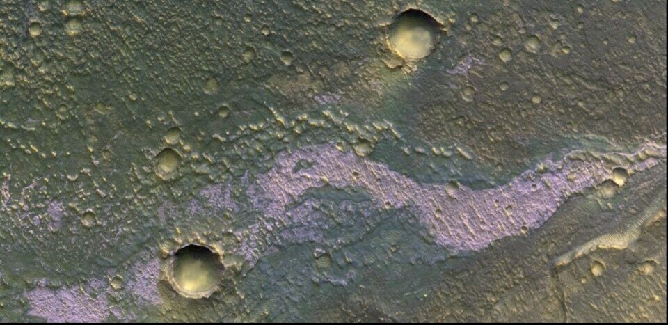 A ''smiley'' that may hide secrets about past Martian life spotted on the Red Planet. Photo