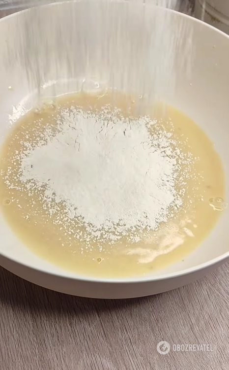 Lazy baked khachapuri with two types of cheese: how to prepare a mouthwatering pastry