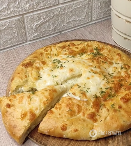 Lazy baked khachapuri with two types of cheese: how to prepare a mouthwatering pastry