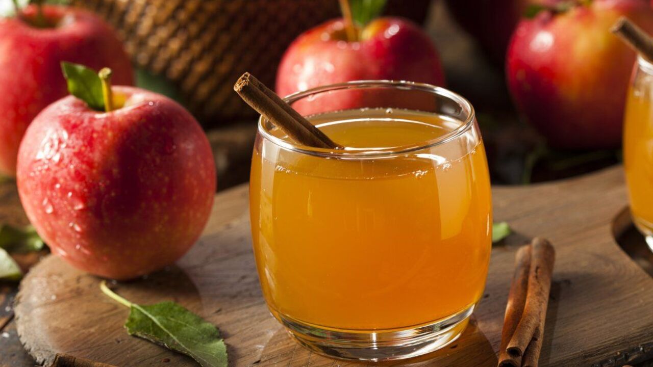 Sandora juice for the winter: how to make a delicious drink from apples and grapes