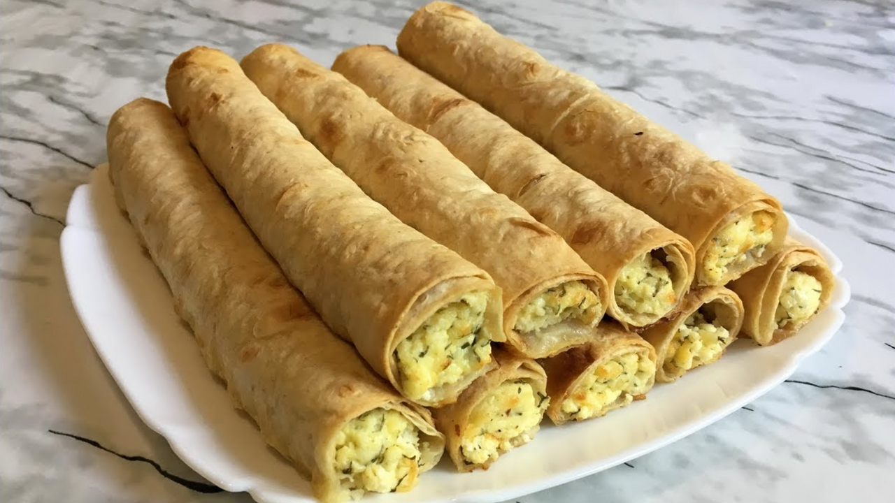 Juicy tubes with cheese and tuna: a quick snack in 20 minutes