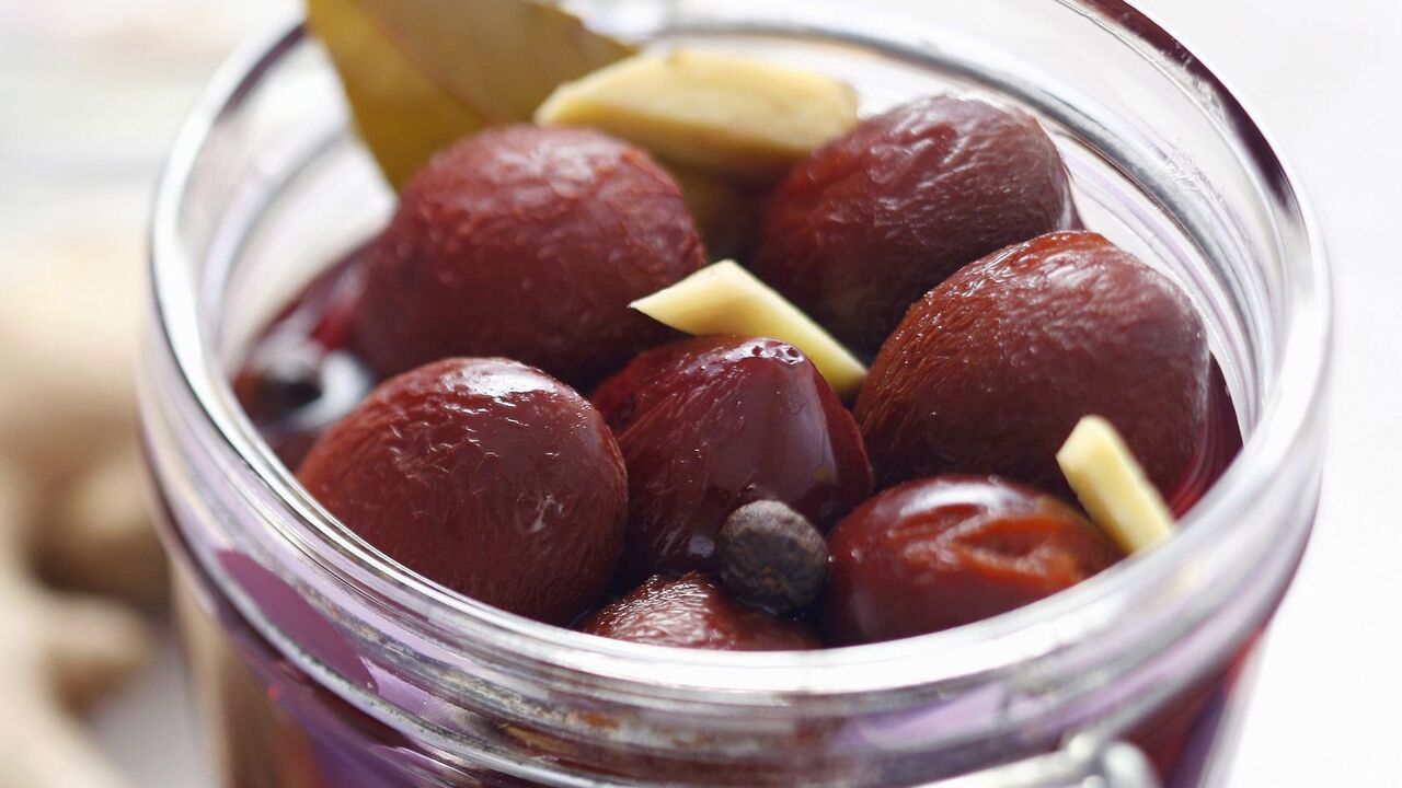 Spicy pickled plums for winter that are suitable for desserts or as an appetizer