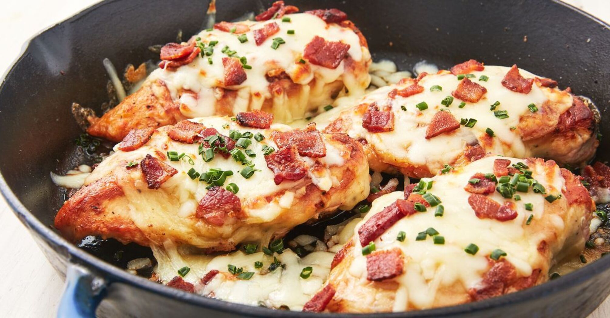 Juicy chicken cutlets with cheese and tomatoes for lunch: cooked in the oven