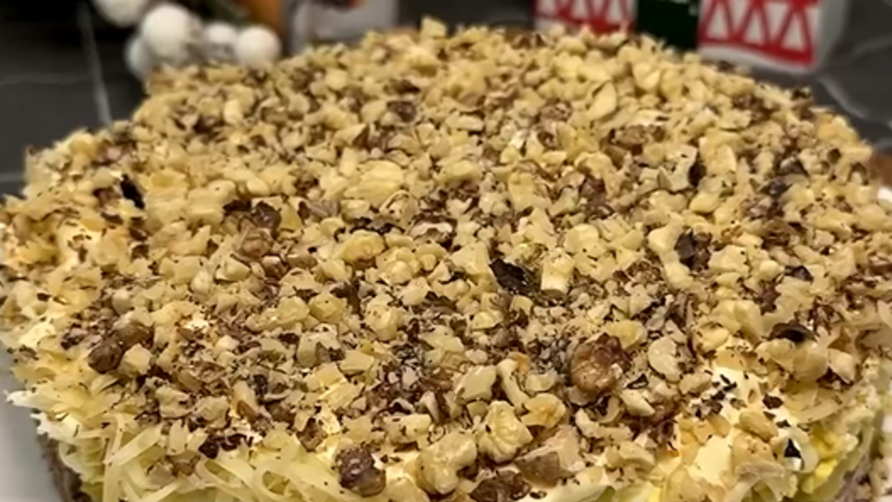 Spectacular Prince salad with meat and nuts for the New Year's table
