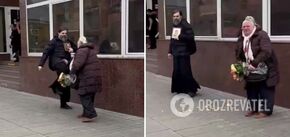 In Russia, begging for alms, a man in a cassock and holding an icon beat a pensioner: he did not like the 'competition'. Video.