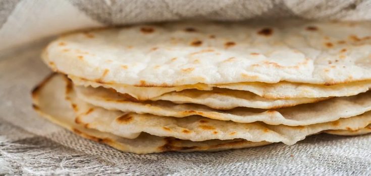 Cheap three-ingredient homemade pita bread: cooked in a frying pan