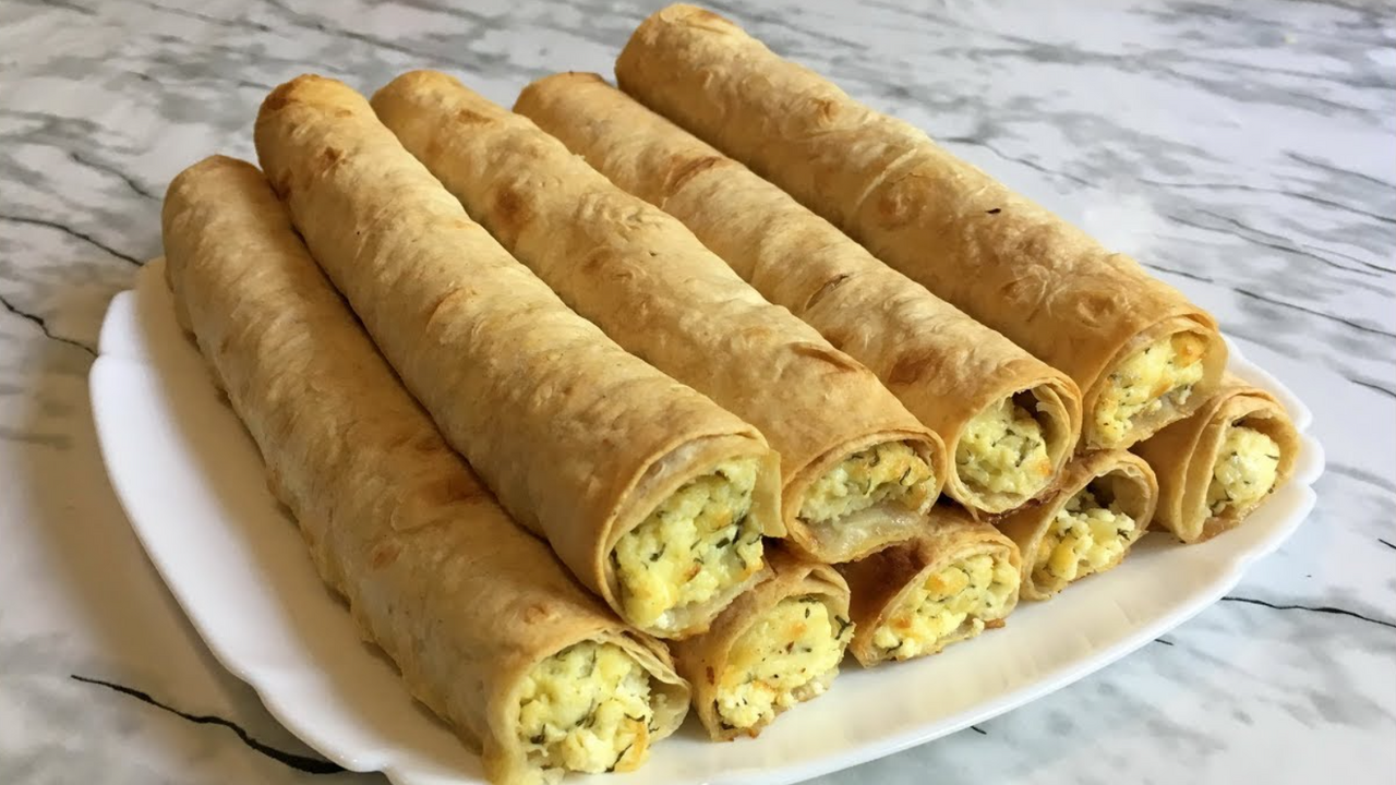 New-style pita rolls with cheese: a hearty snack in 20 minutes