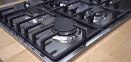 How to clean the grill of a gas stove from grease: three most effective ways