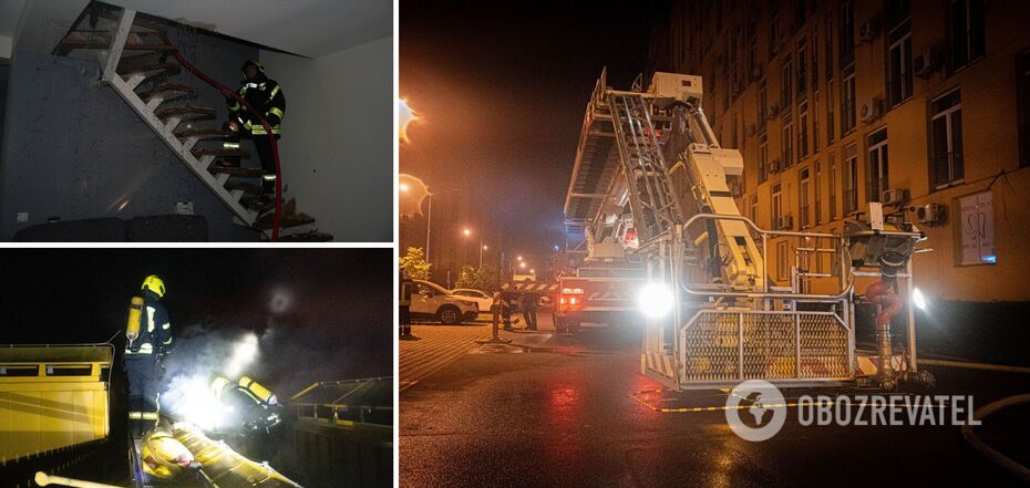 Rescuers extinguish fire on the roof of a high-rise building
