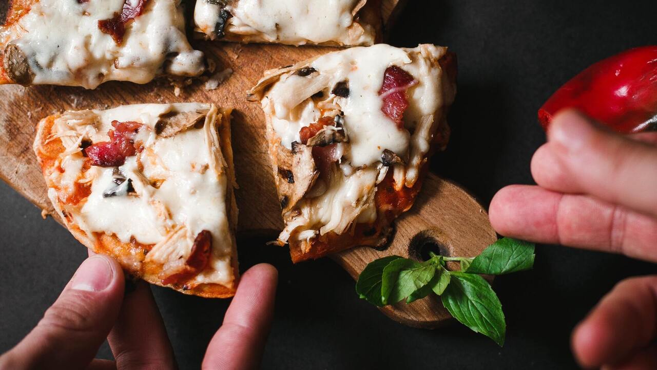 Crispy mini pizza on yeast for a snack: any filling will do