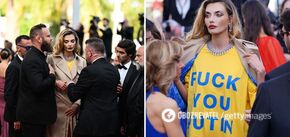 Supermodel Baikova arrives at the Cannes Film Festival wearing a F*ck you Putin T-shirt: she was surrounded by bodyguards. Photos and videos