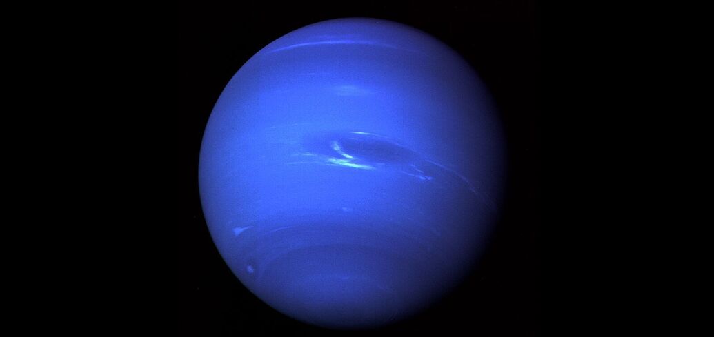 Astronomers look into Neptune's dark spot from Earth for the first time and see something strange