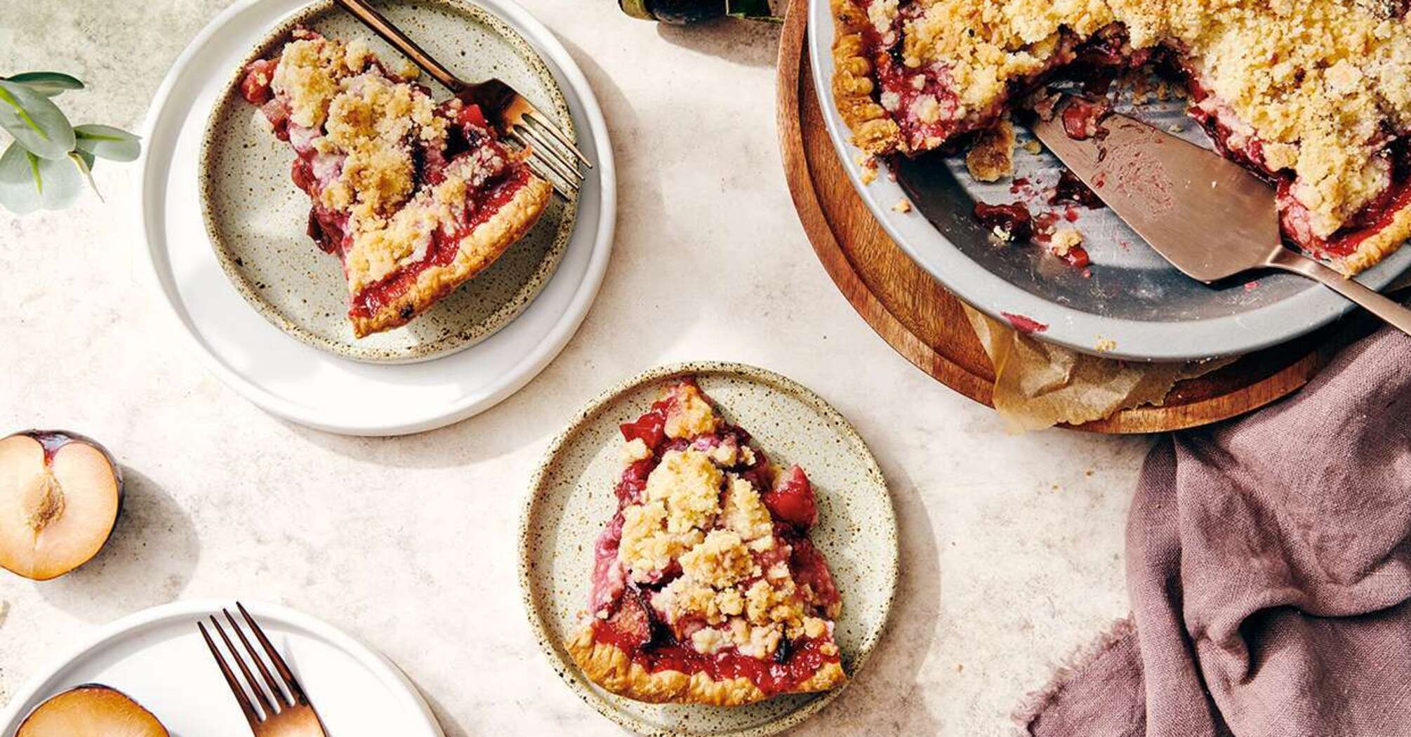 Seasonal plum pie with a crispy crust that is tastier than charlotte