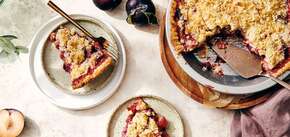 Seasonal plum pie with a crispy crust that is tastier than charlotte
