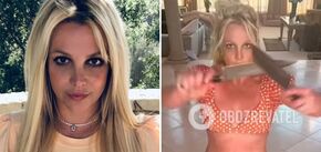 Britney Spears in a bikini did a revealing dance with knives and scared the dogs. Video
