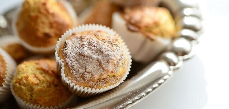 Fluffy seasonal muffins for tea: tangerines inside