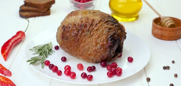 Turkey roll with brie and cherries a la Wellington