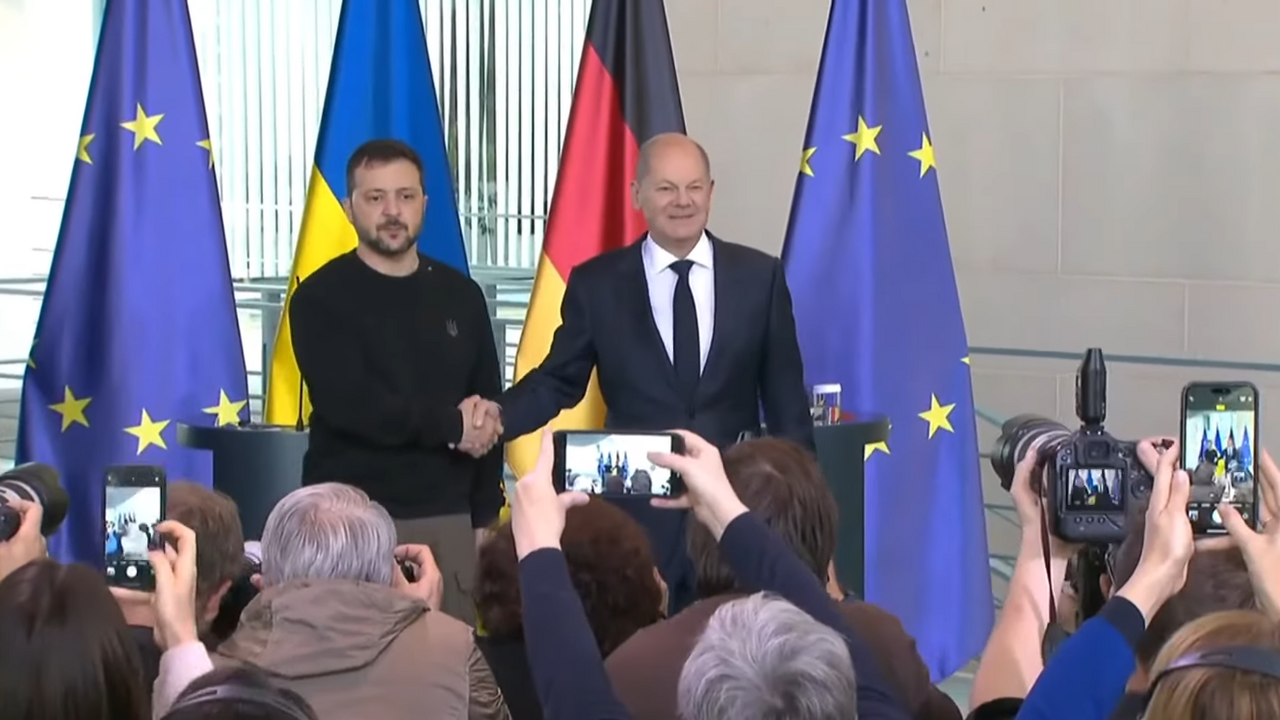Zelenskyy and Scholz shake hands
