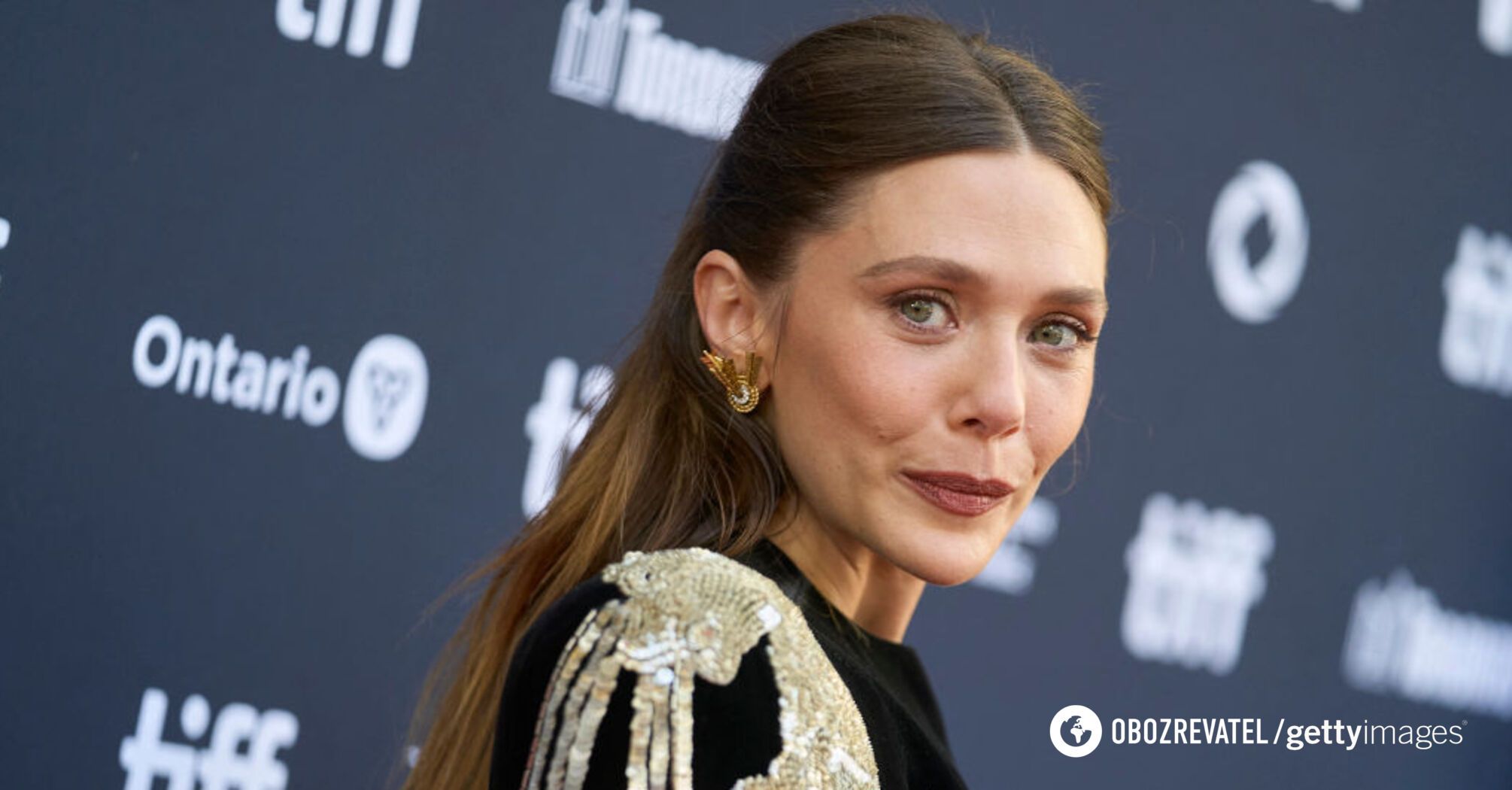 Elizabeth Olsen showed the perfect shoes for traveling by plane. Photo