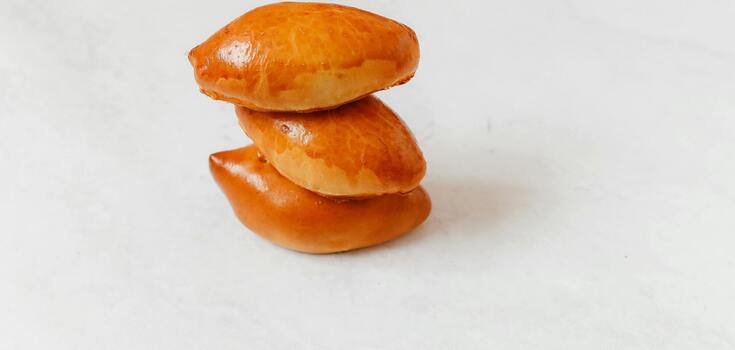 Delicious and fluffy pumpkin pies: a dough recipe for 12 pieces
