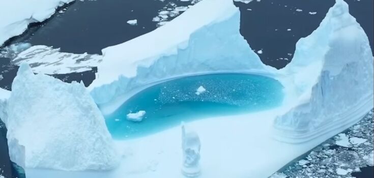 A Ukrainian polar explorer filmed an iceberg with its own pool from a drone. Video