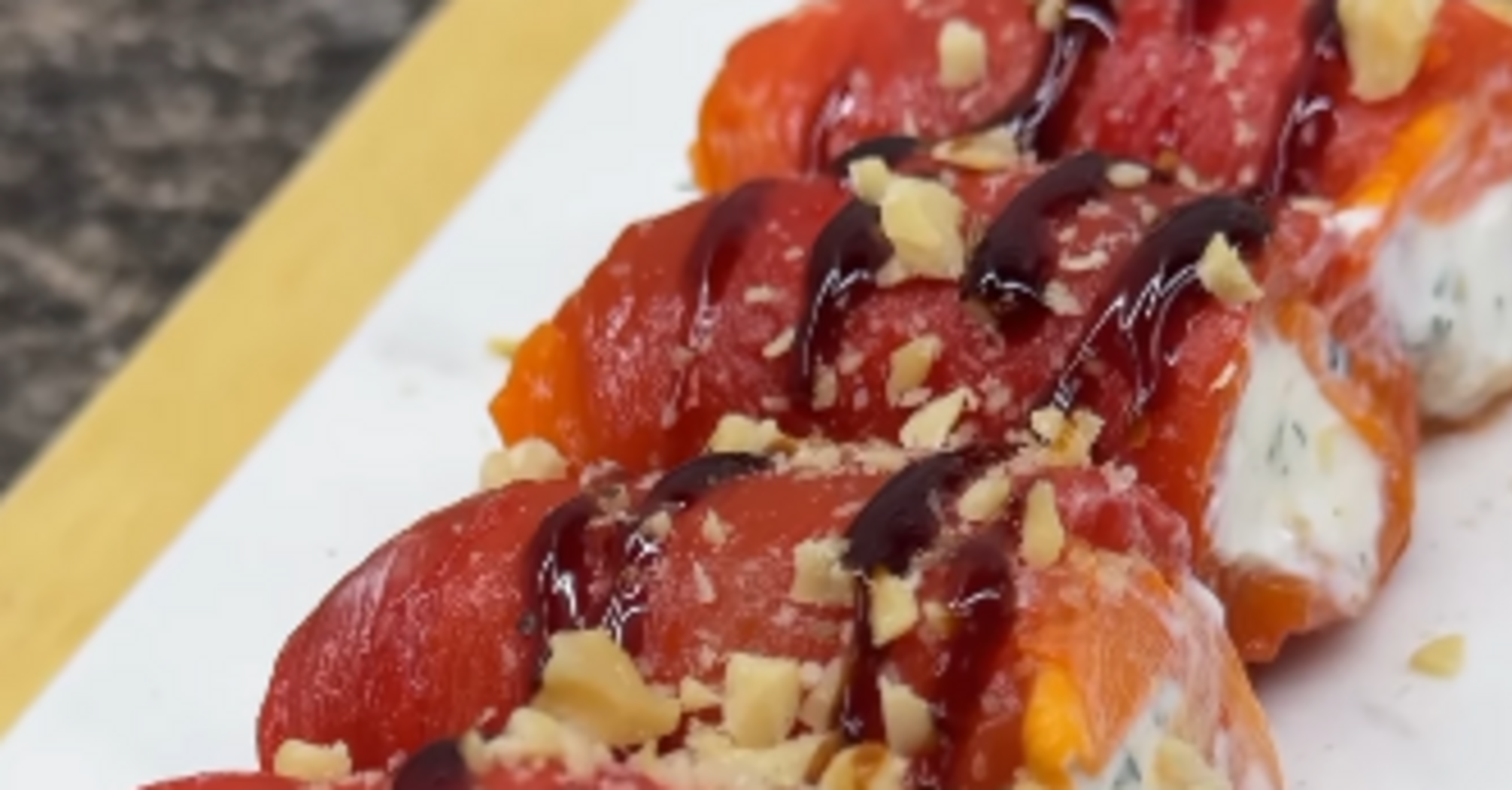 Roasted pepper rolls stuffed with feta: an unusual dish made from familiar products