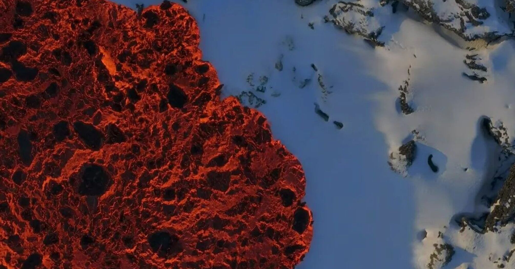 Fire versus ice: a video from Iceland, where lava oozes out from under the snow, fascinated the world. How is this possible?