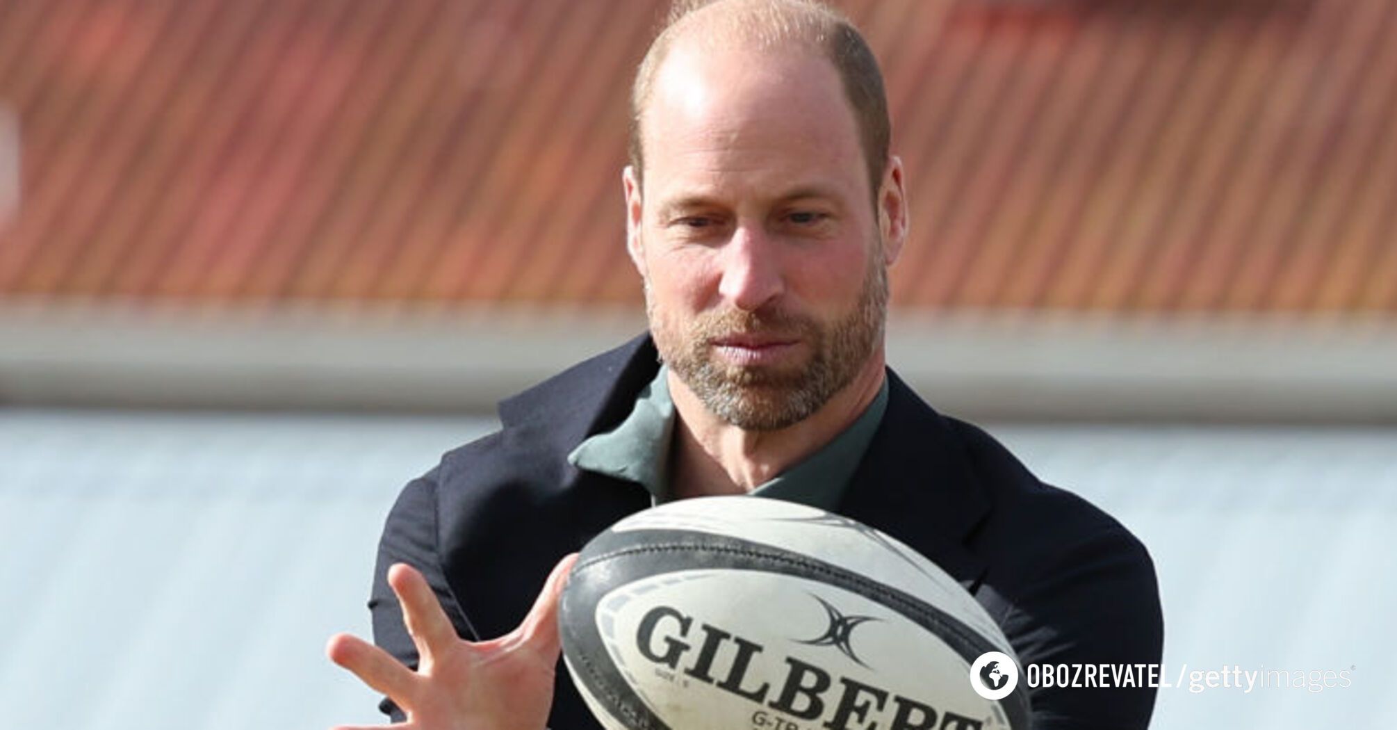 Prince William in a business suit played rugby with African children. The funniest photos