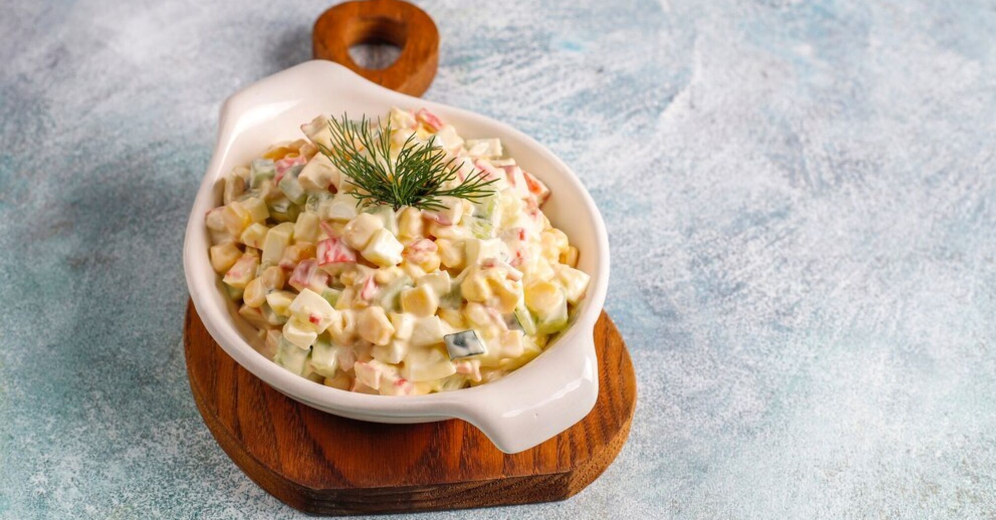 New Year's salad with crab sticks and corn: easier to prepare than the popular Olivier