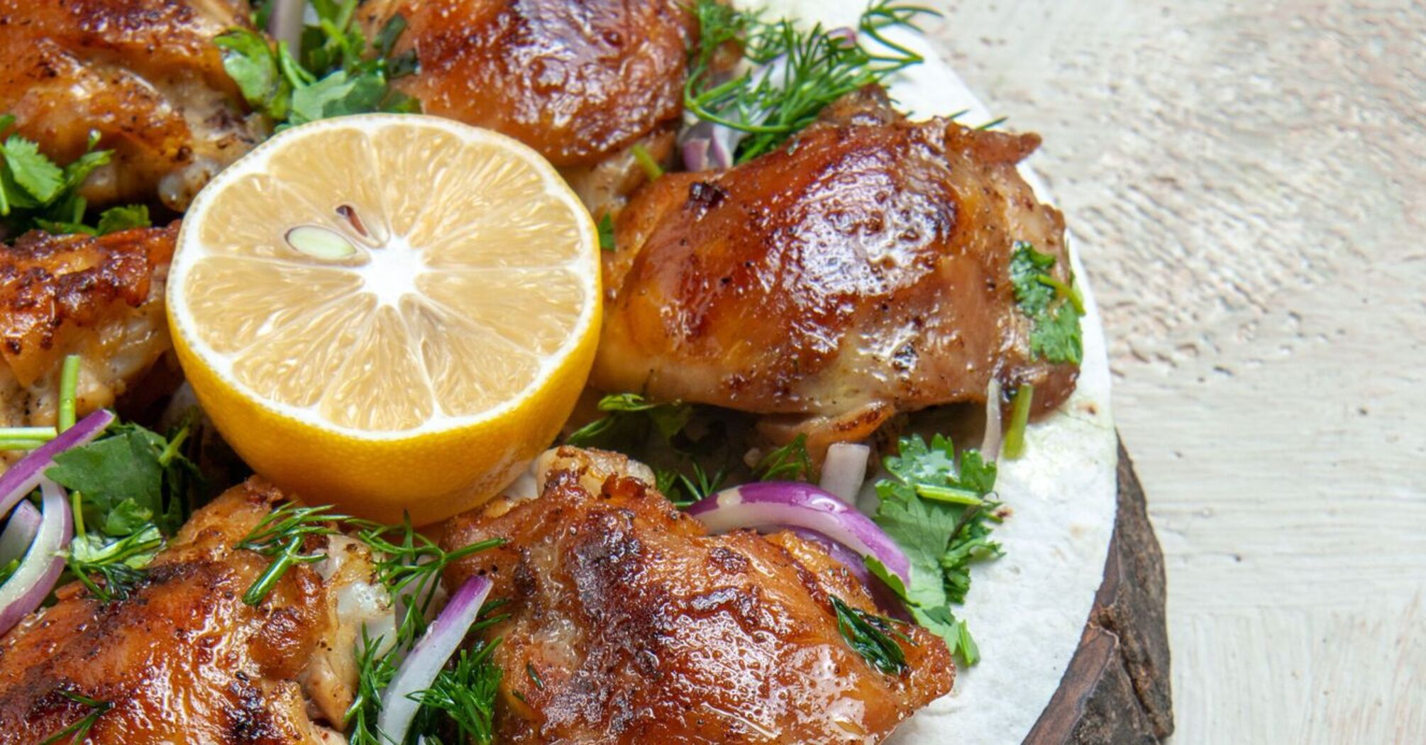 Juicy and flavorful chicken thighs: an interesting idea for a New Year's meat dish