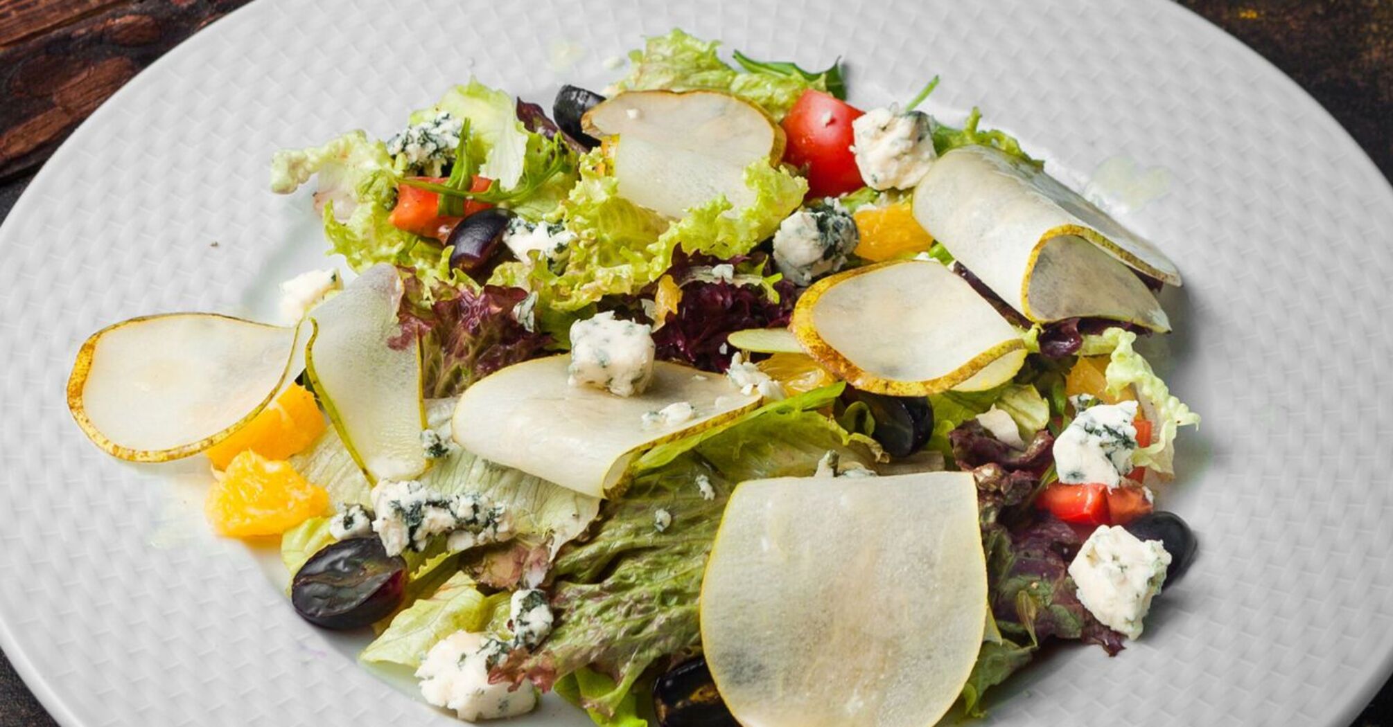 An unusual exquisite salad for the holiday table: just add pear, jamon and brie cheese