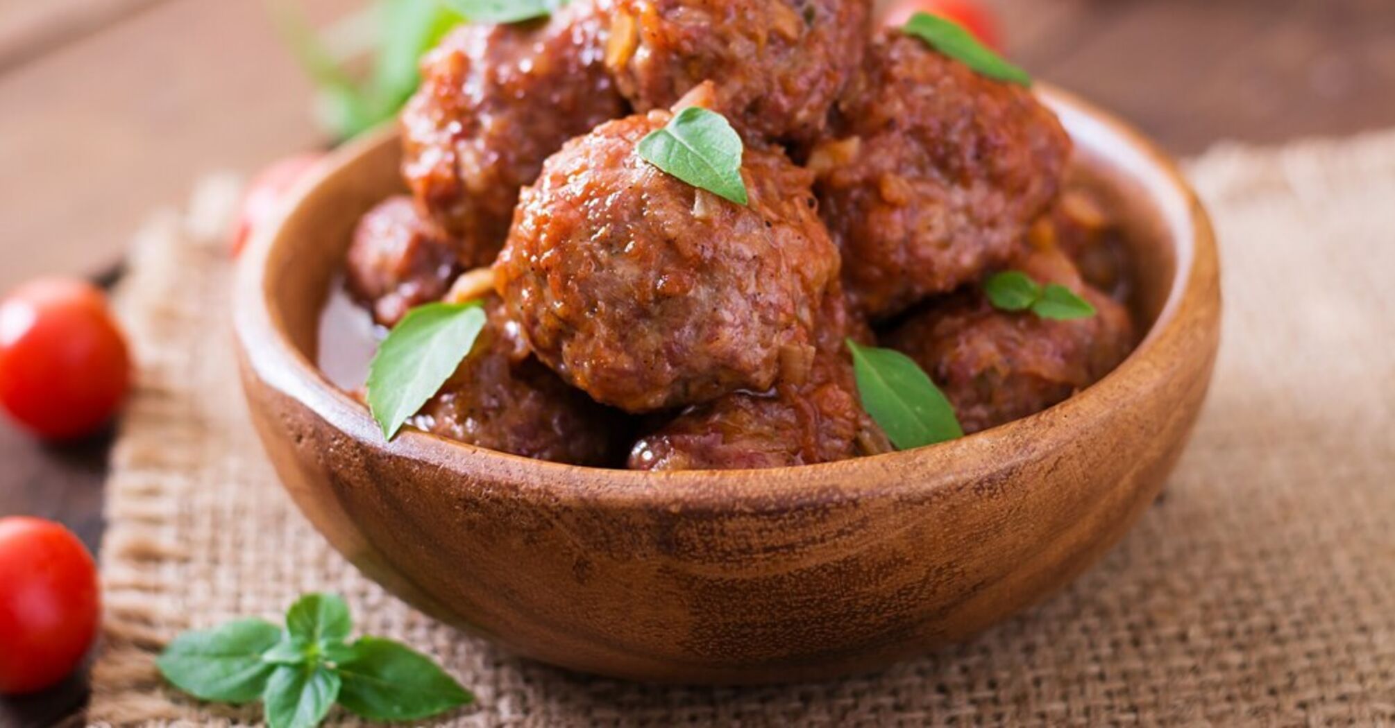 Tastier than cutlets: how to cook juicy meatballs with bulgur in the oven