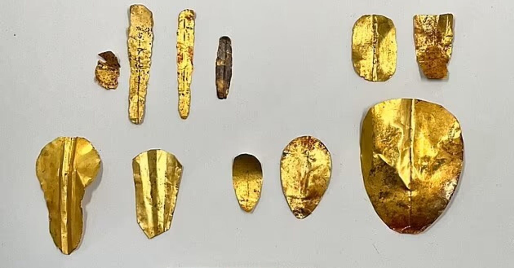 More than a dozen mummies decorated with golden tongues and nails were found in 2000-year-old tombs in Egypt. Photo