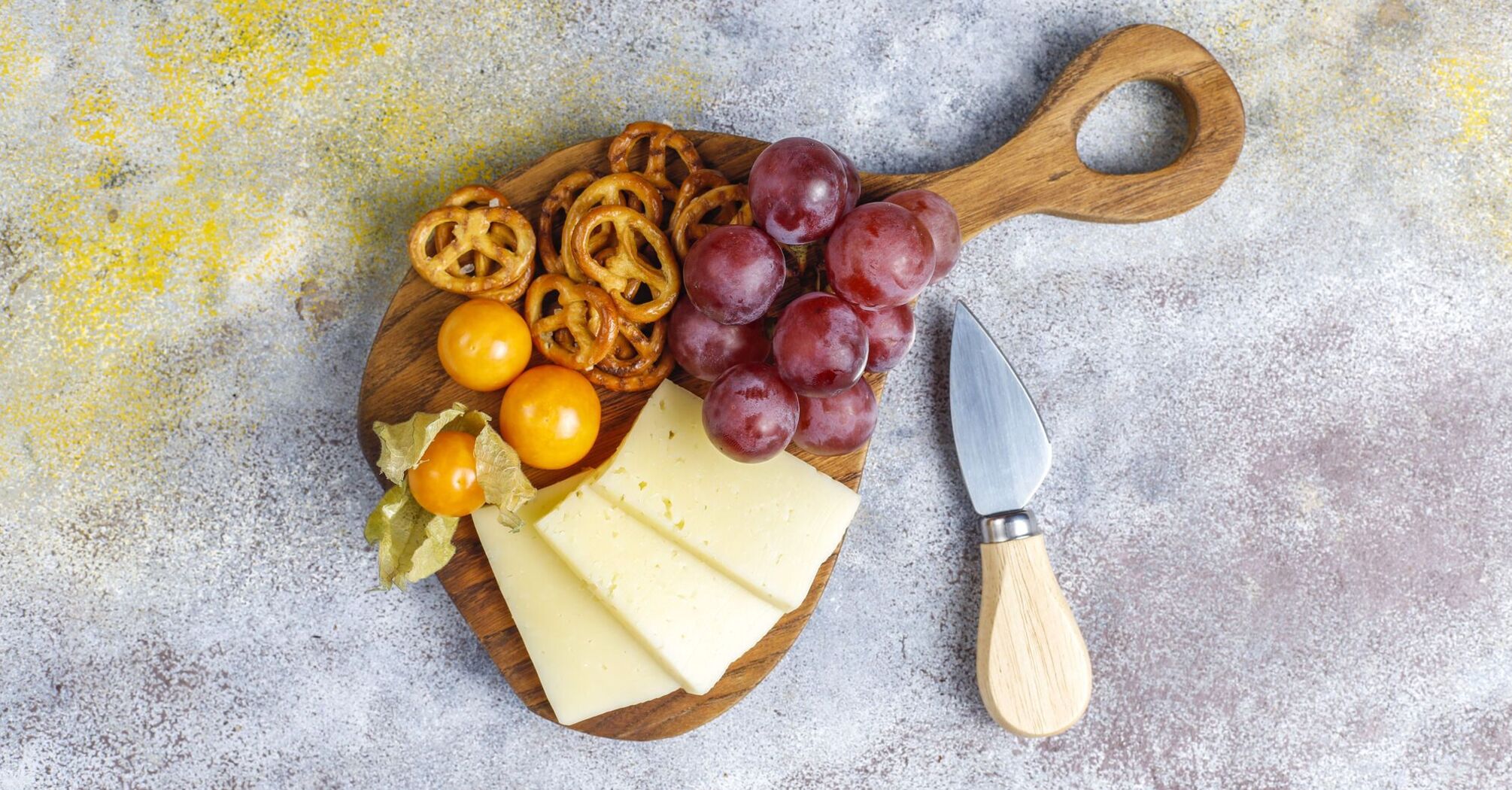 Not just cutting sausage: how to decorate a cheese and meat plate for the New Year in an original way