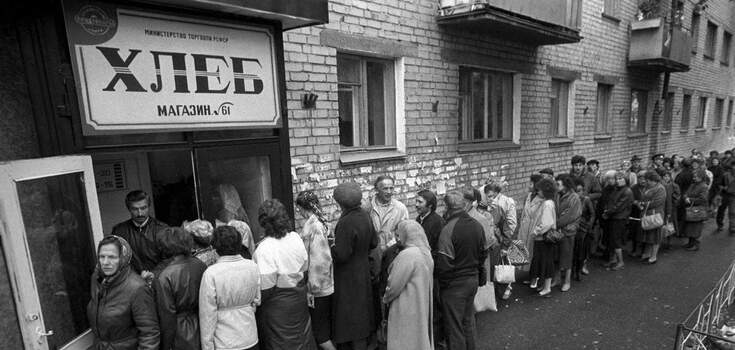 Soviet people standing in a queue to buy bread