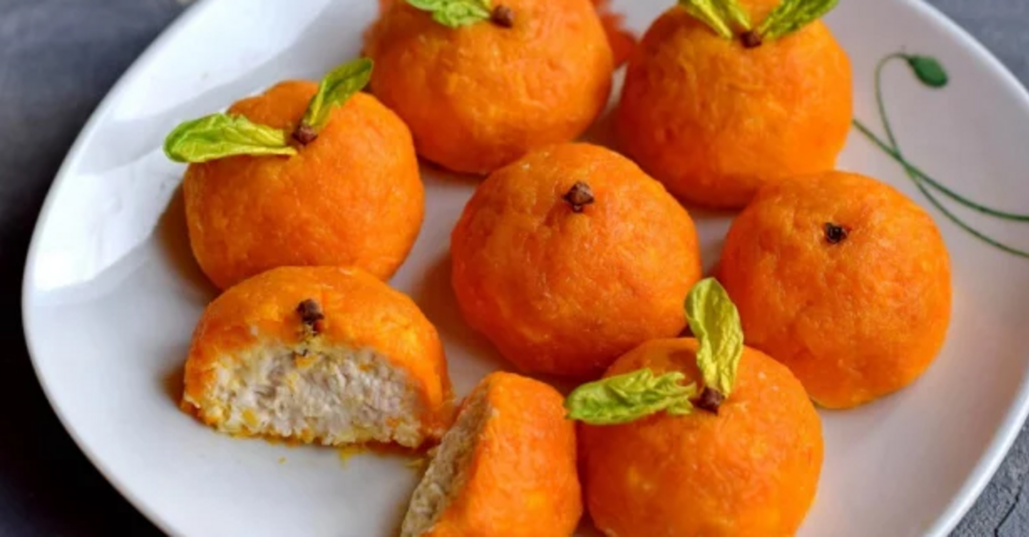 Salty appetizer "Tangerines": how to prepare a beautiful atmospheric dish for the New Year