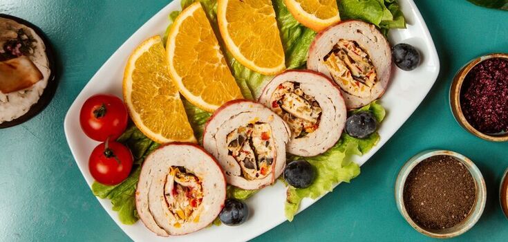 Juicy meat rolls with pineapple in the oven: how to make a delicious lunch dish