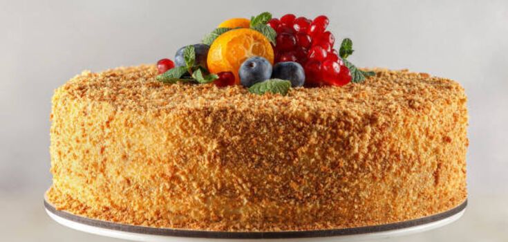 Spectacular chocolate Honey cake with cherry filling: an improved version of the popular dessert