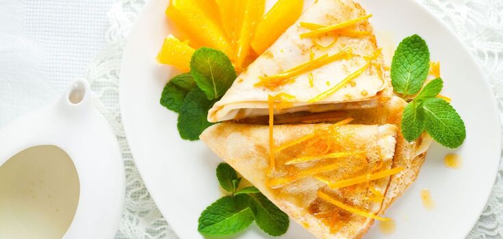 Crêpes Suzette, or French kiss: how to make a popular dish from ready-made pancakes